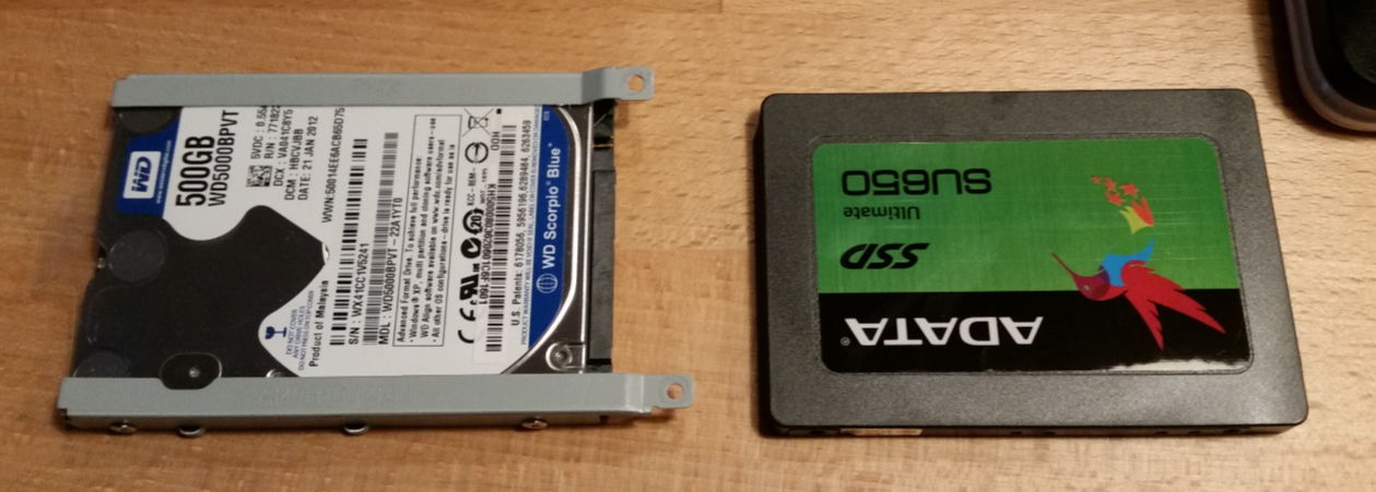 Removing the drive bracket from the WD drive. to add to the Adata SU650 SSD